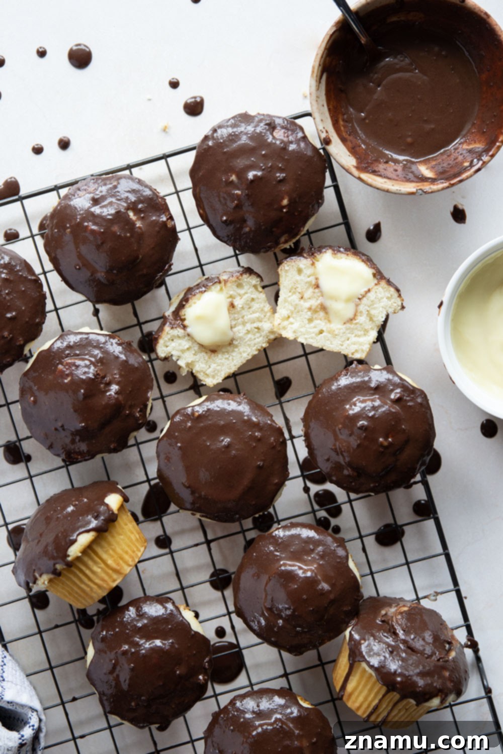 Classic Boston Cream Pie Cupcakes 2 These Boston cream pie cupcakes feature soft and buttery white cupcakes filled with vanilla pastry cream and topped with rich chocolate ganache.