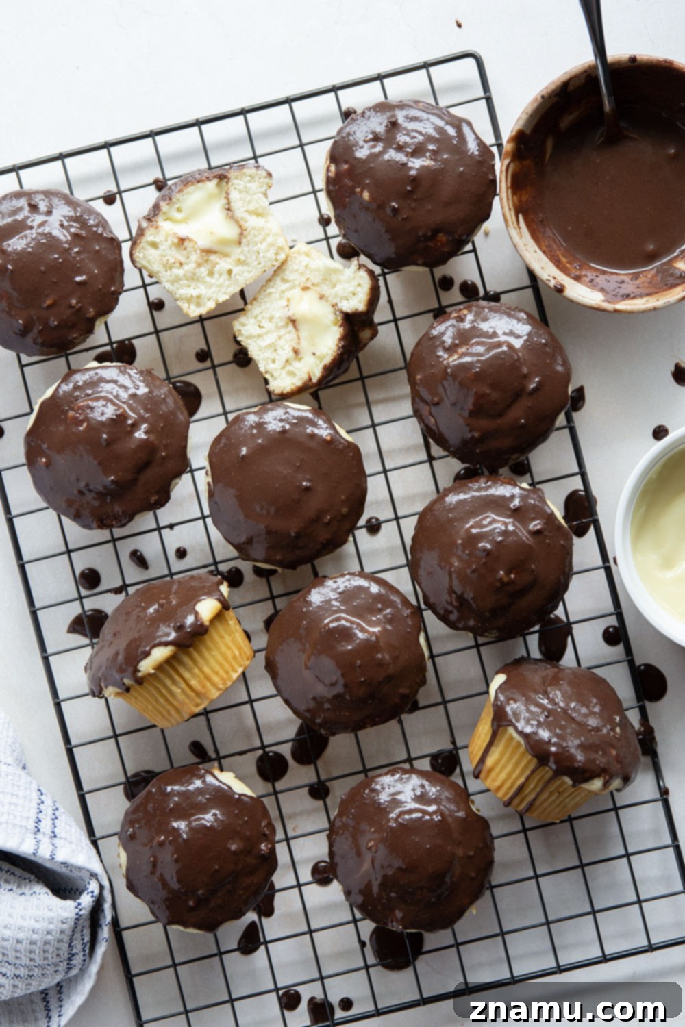 Classic Boston Cream Pie Cupcakes 4 These Boston cream pie cupcakes feature soft and buttery white cupcakes filled with vanilla pastry cream and topped with rich chocolate ganache.