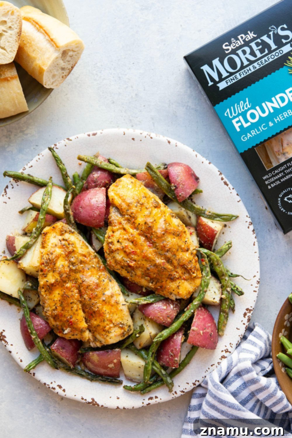 Garlic Herb Baked Flounder and Roasted Red Potatoes 2 Flavorful garlic herb baked flounder, tender roasted red potatoes and green beans are the perfect trio in this fast and flavorful sheet pan dinner!