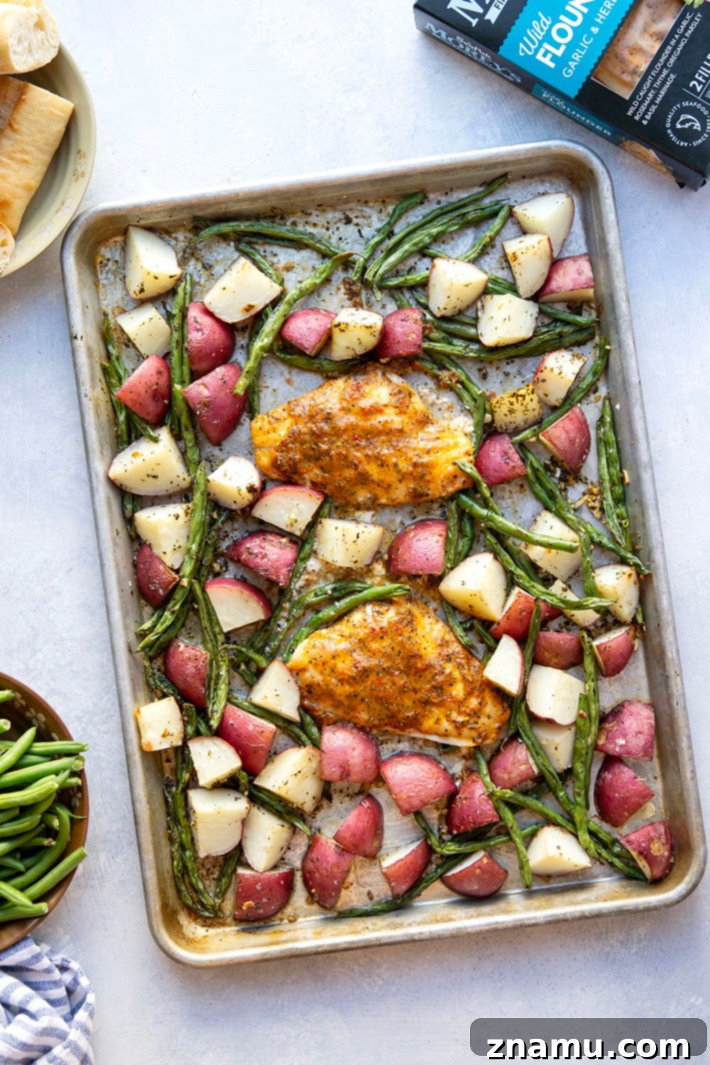 Garlic Herb Baked Flounder and Roasted Red Potatoes 3 Flavorful garlic herb baked flounder, tender roasted red potatoes and green beans are the perfect trio in this fast and flavorful sheet pan dinner!