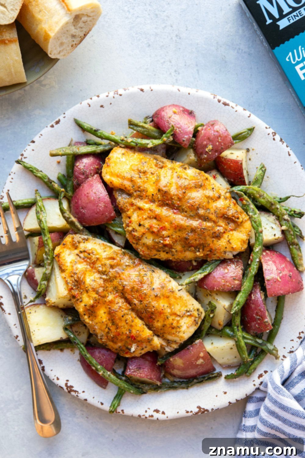 Garlic Herb Baked Flounder and Roasted Red Potatoes 4 Flavorful garlic herb baked flounder, tender roasted red potatoes and green beans are the perfect trio in this fast and flavorful sheet pan dinner!