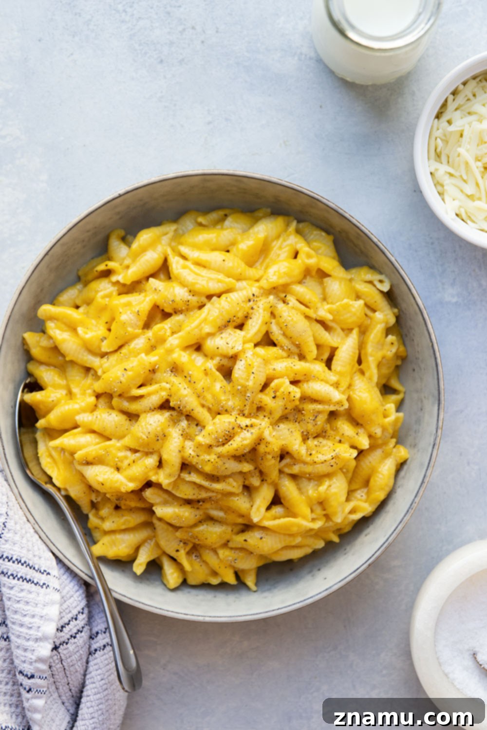 Velvety Instant Pot Butternut Squash Mac and Cheese 4 Close-up of creamy butternut squash mac and cheese with melted cheese pull