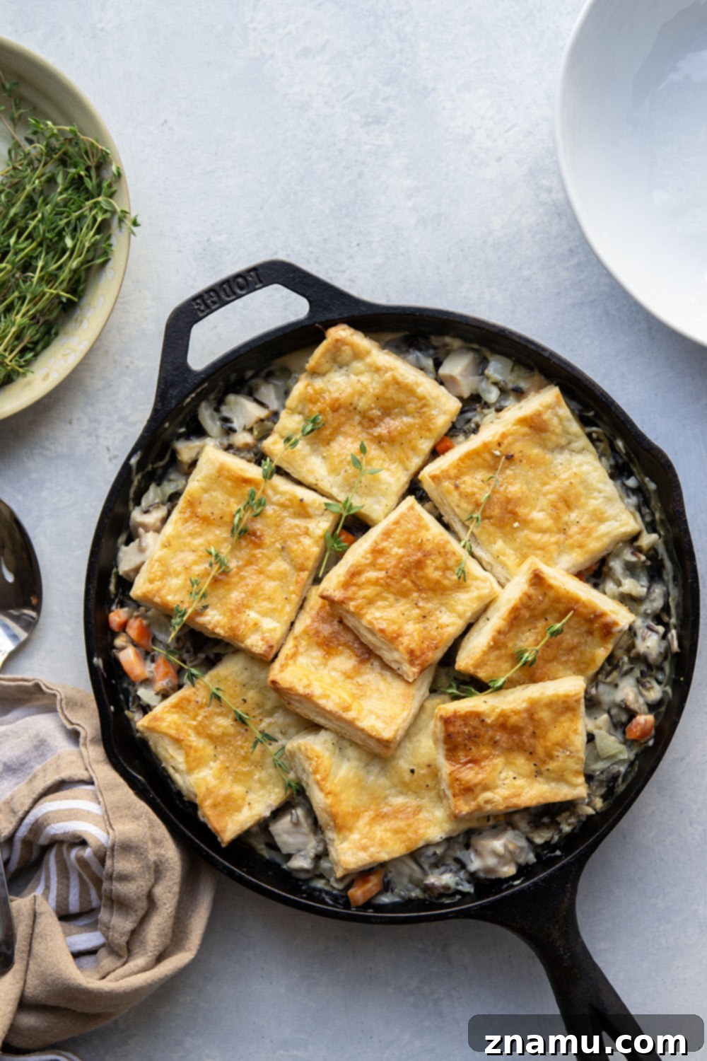 Hearty Turkey Wild Rice Pot Pie 4 This turkey wild rice pot pie features a creamy filling of wild rice and turkey with flaky homemade pastry squares baked on top. It's the perfect use for leftover turkey!