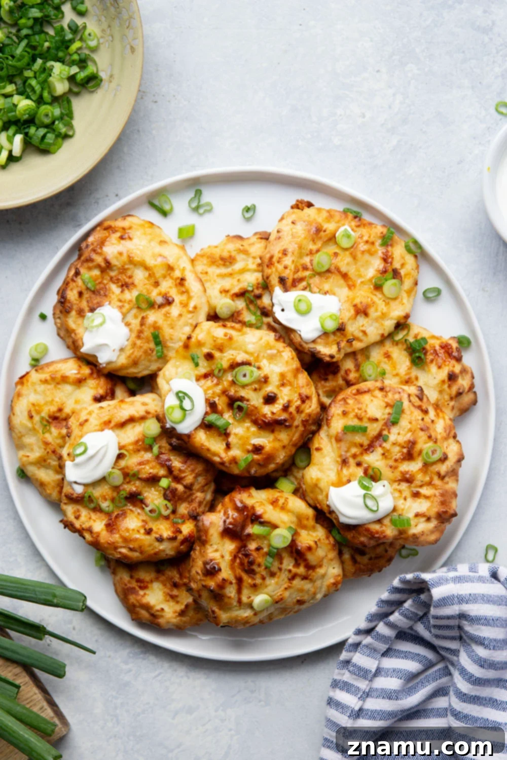 Crispy Air Fryer Mashed Potato Cakes 2 Crispy Air Fryer Mashed Potato Cakes made from leftover mashed potatoes.