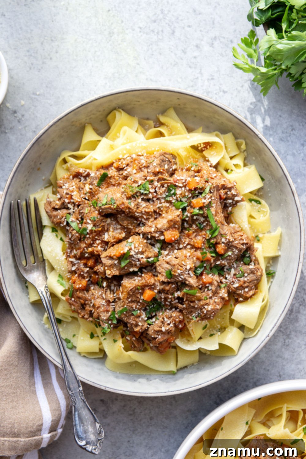 Rustic Slow Cooked Beef Ragu 4 Slow cooked to perfect fall-apart tender perfection and loaded with hearty flavors, this slow cooker beef ragu is incredible over warm pappardelle pasta and a comfort food favorite!