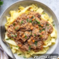 Slow cooked to perfect fall-apart tender perfection and loaded with hearty flavors, this slow cooker beef ragu is incredible over warm pappardelle pasta and a comfort food favorite!