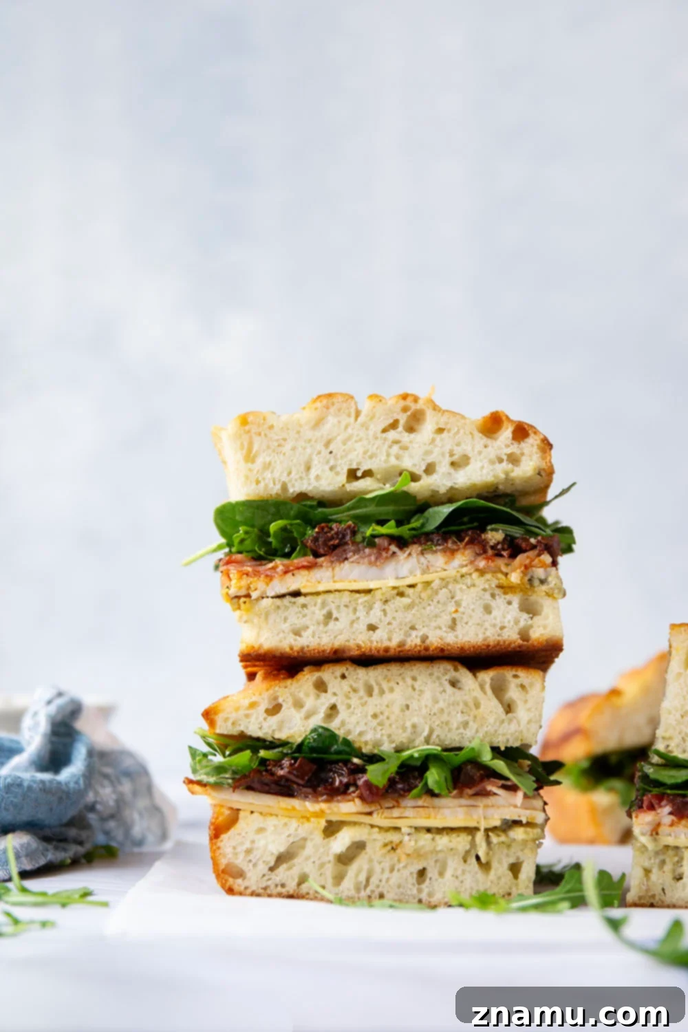 Sun-Dried Tomato & Turkey Focaccia 4 Layers of roast turkey, cheese, and flavorful sun-dried tomatoes star in this turkey focaccia sandwich that's so easy to whip up and perfect for leftover turkey!