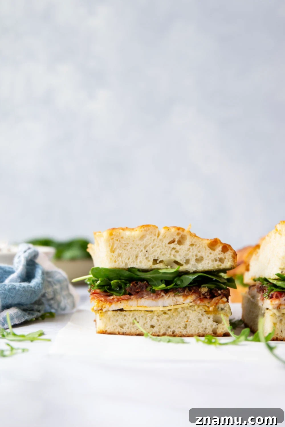 Sun-Dried Tomato & Turkey Focaccia 6 Layers of roast turkey, cheese, and flavorful sun-dried tomatoes star in this turkey focaccia sandwich that's so easy to whip up and perfect for leftover turkey!
