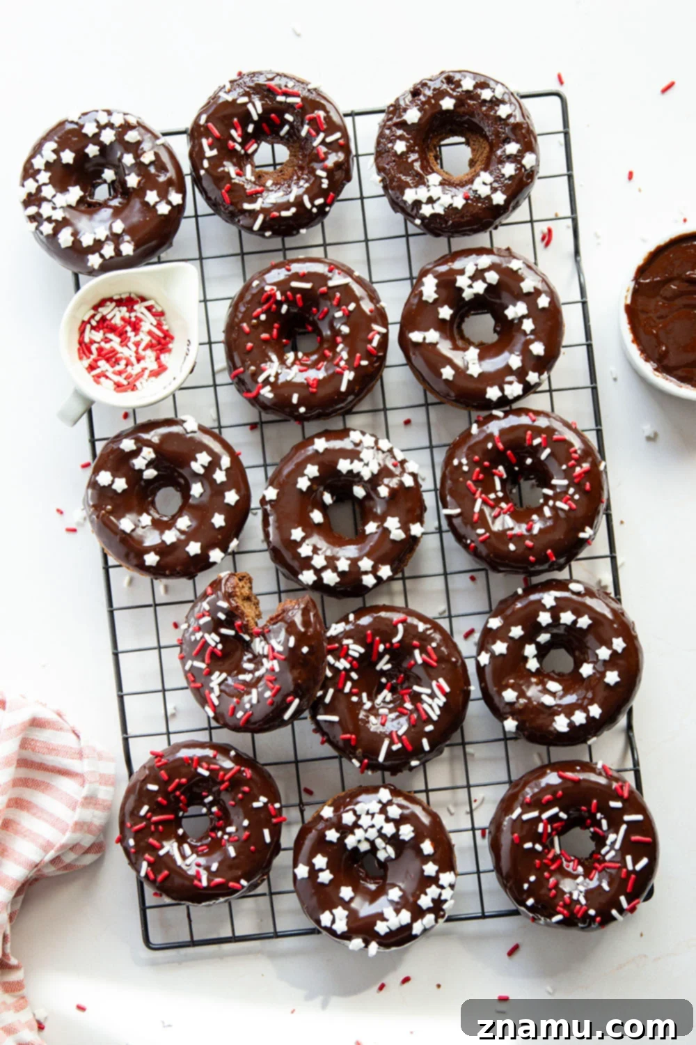 Fudgy Baked Chocolate Cake Donuts 3 These baked chocolate cake donuts have a super soft texture and are incredible dipped in a rich chocolate ganache with lots of sprinkles on top!