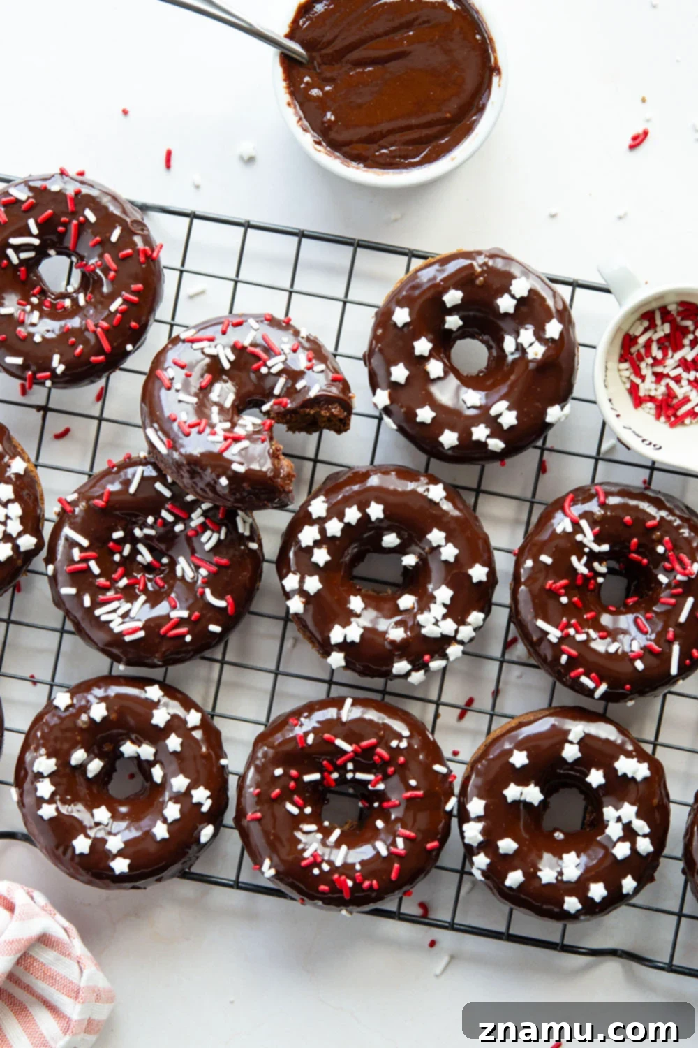 Fudgy Baked Chocolate Cake Donuts 4 These baked chocolate cake donuts have a super soft texture and are incredible dipped in a rich chocolate ganache with lots of sprinkles on top!