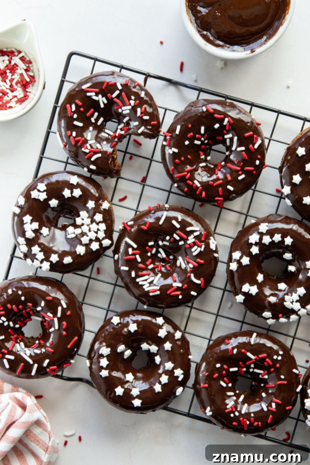 Fudgy Baked Chocolate Cake Donuts 6 These baked chocolate cake donuts have a super soft texture and are incredible dipped in a rich chocolate ganache with lots of sprinkles on top!