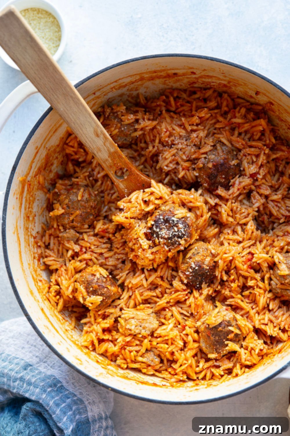 Creamy Vodka Orzo with Meatballs 5 Ingredients laid out for making meatballs and orzo alla vodka, including ground beef, tomatoes, and herbs.