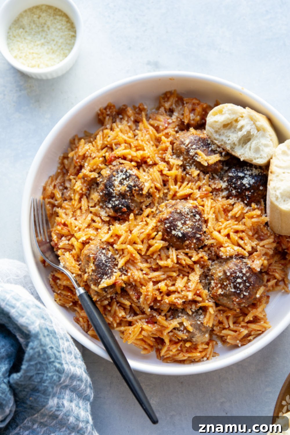 Creamy Vodka Orzo with Meatballs 6 Serving of meatballs and orzo alla vodka with fresh bread and Parmesan cheese.