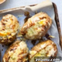French Onion Baked Potatoes with melted cheese
