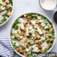 Crispy Chickpea & Creamy Avocado Caesar 8 Loaded with silky avocado, sharp Parmesan, and crispy chickpeas and croutons, this chickpea caesar salad is a delicious twist on the classic and goes well with so many meals!