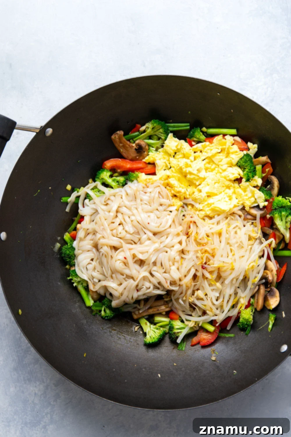 Vibrant Veggie Pad Thai 3 Loaded with sautéed veggies and tender noodles in a savory sauce, this vegetarian pad thai is so packed with flavor, you won't even miss the meat!