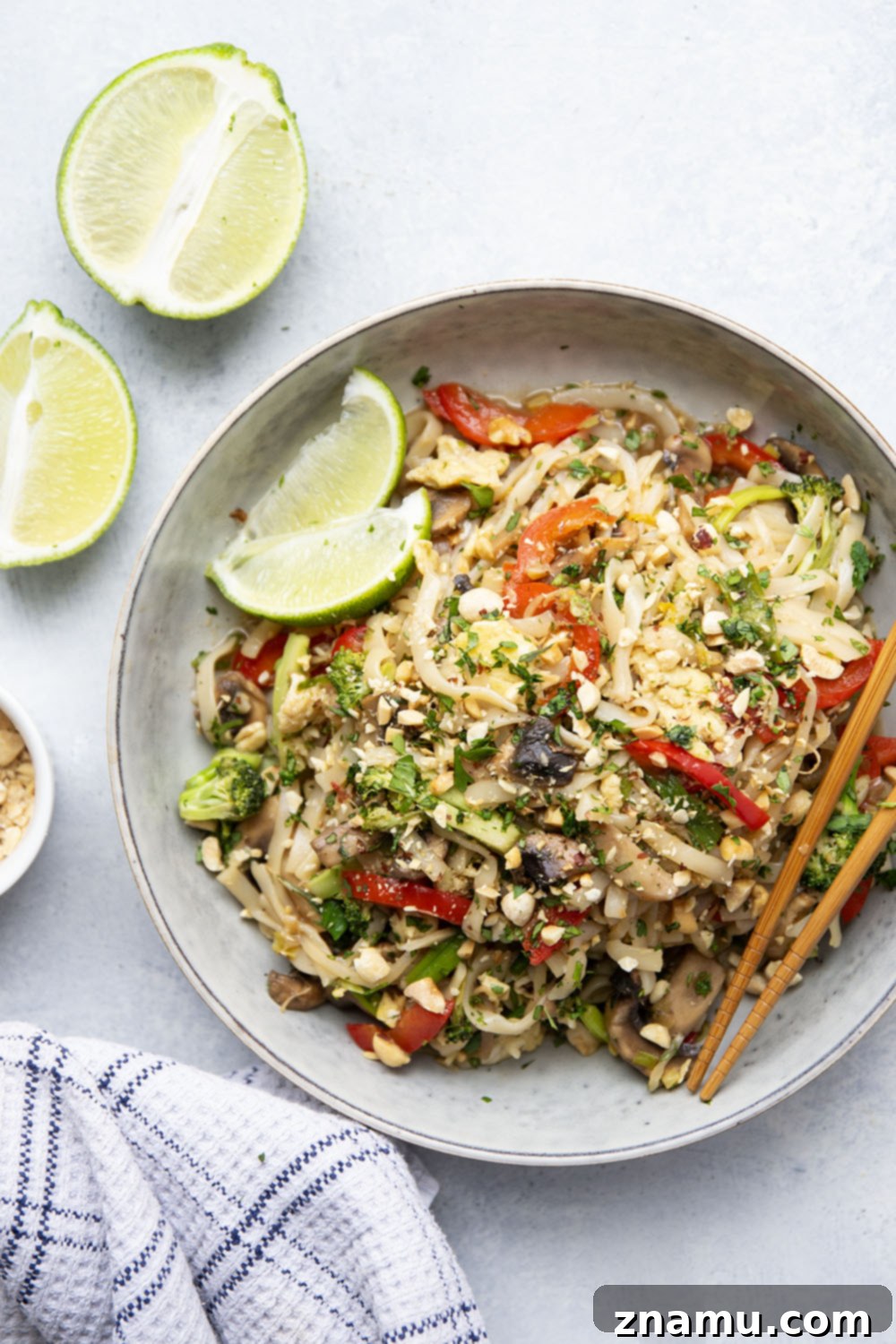 Vibrant Veggie Pad Thai 5 Loaded with sautéed veggies and tender noodles in a savory sauce, this vegetarian pad thai is so packed with flavor, you won't even miss the meat!