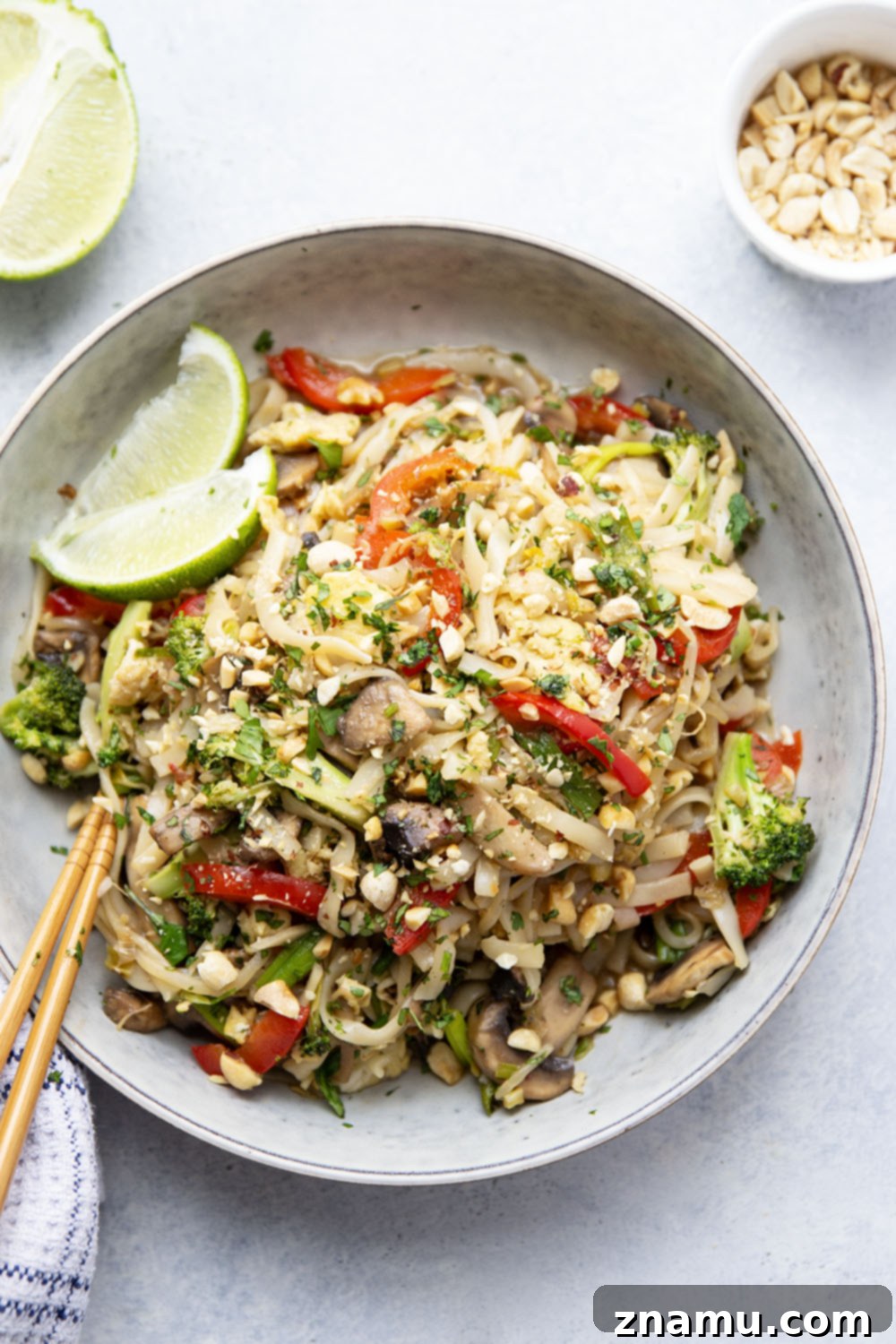 Vibrant Veggie Pad Thai 6 Loaded with sautéed veggies and tender noodles in a savory sauce, this vegetarian pad thai is so packed with flavor, you won't even miss the meat!