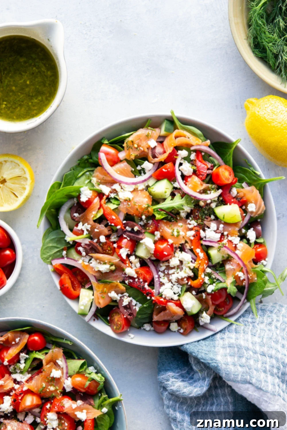 Mediterranean Smoked Salmon Salad 5 This smoked salmon Greek salad is a twist on the classic and features flavorful smoked salmon with a tangy lemon dill vinaigrette tossed with greens and lots of Greek ingredients.