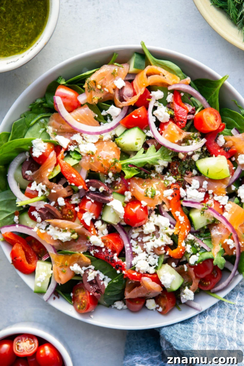 Mediterranean Smoked Salmon Salad 6 This smoked salmon Greek salad is a twist on the classic and features flavorful smoked salmon with a tangy lemon dill vinaigrette tossed with greens and lots of Greek ingredients.