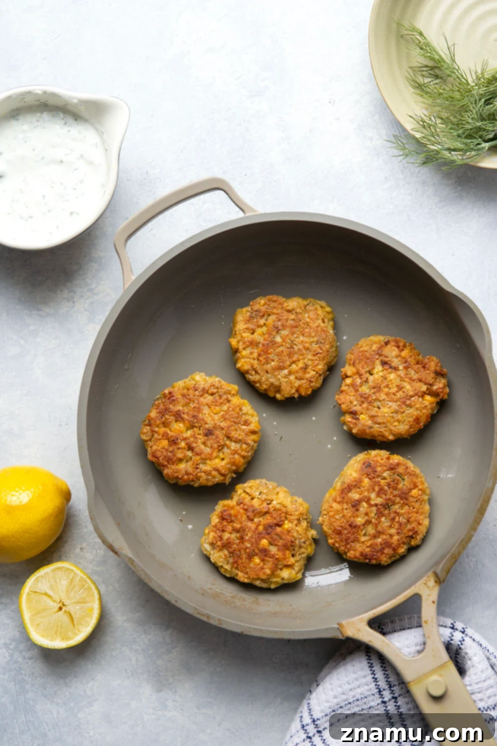Zesty Lemon Dill Chickpea Fritters 3 These chickpea fritters are perfectly crispy and pair incredibly well with a tangy fresh lemon dill sauce for dipping!