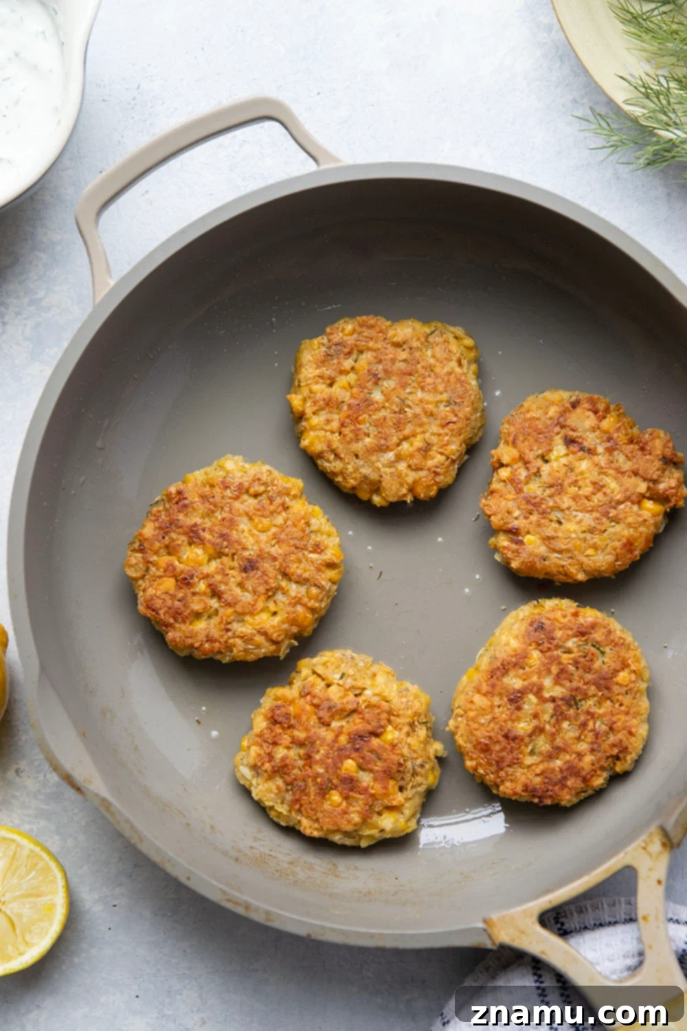 Zesty Lemon Dill Chickpea Fritters 5 These chickpea fritters are perfectly crispy and pair incredibly well with a tangy fresh lemon dill sauce for dipping!
