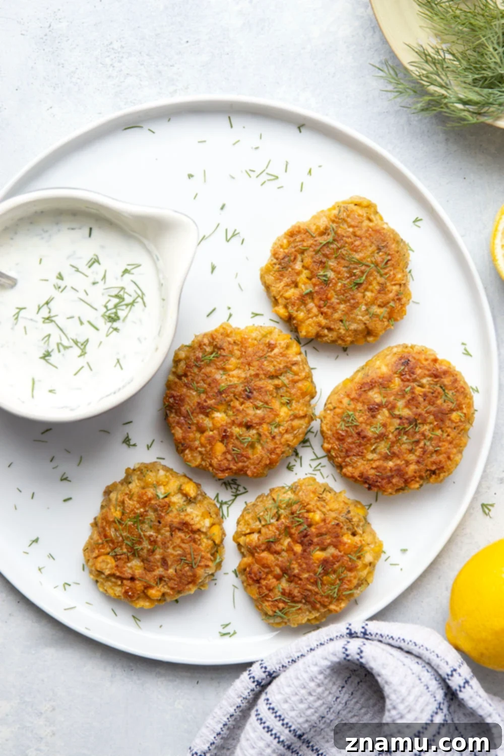 Zesty Lemon Dill Chickpea Fritters 6 These chickpea fritters are perfectly crispy and pair incredibly well with a tangy fresh lemon dill sauce for dipping!
