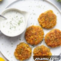 These chickpea fritters are perfectly crispy and pair incredibly well with a tangy fresh lemon dill sauce for dipping!