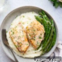 Simmered in a creamy white wine sauce with tender green beans, this white white chicken is incredible over mashed potatoes and a fancy-feeling dinner you can pull off in minutes!
