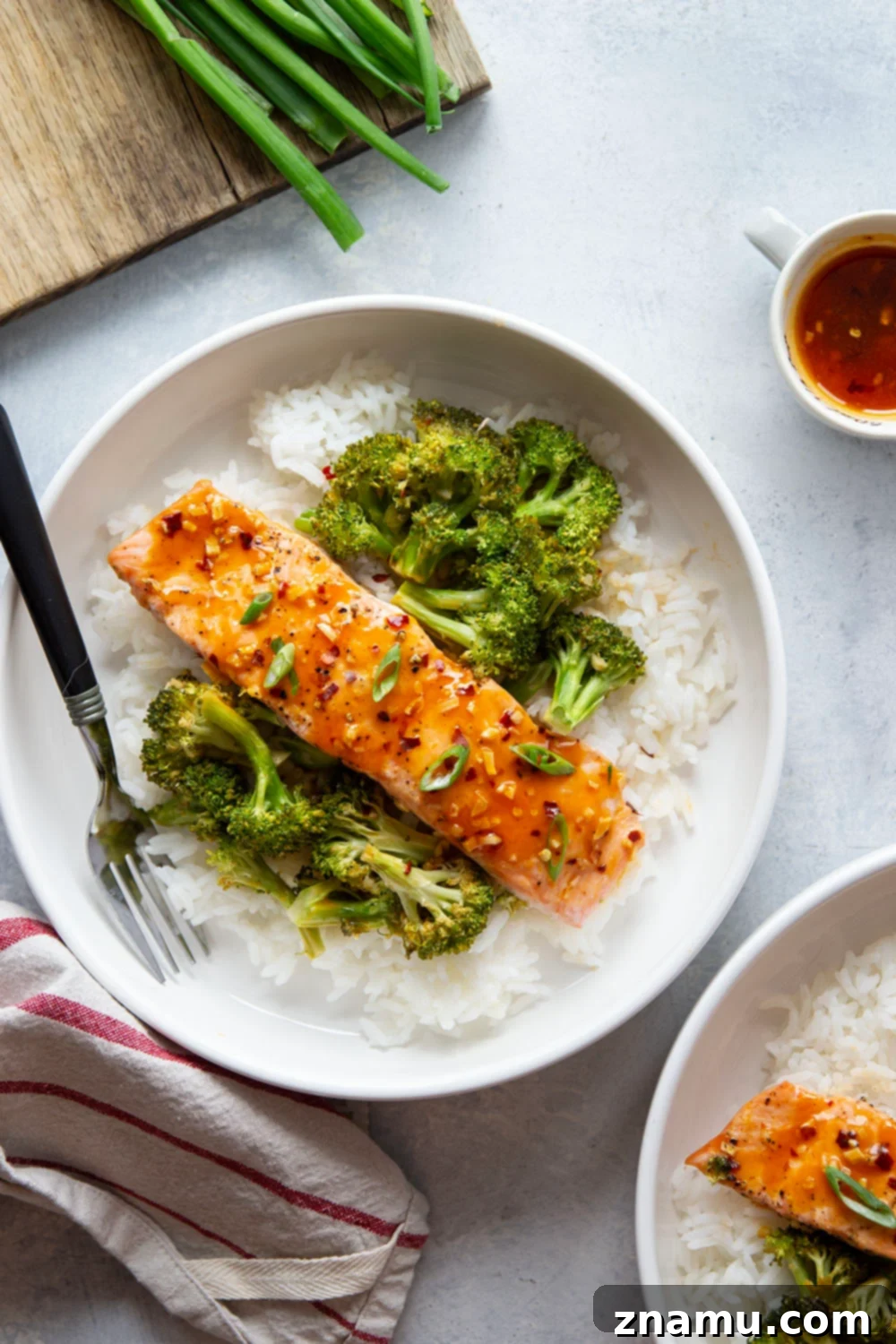 Spicy Honey Glazed Salmon with Roasted Broccoli 2 Glazed in a sweet and spicy hot honey sauce and roasted alongside tender broccoli, this hot honey glazed salmon is a quick weeknight meal that comes together on one sheet pan. Discover the ultimate easy weeknight dinner recipe for a flavorful and healthy meal.