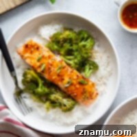 Spicy Honey Glazed Salmon with Roasted Broccoli 8 Glazed in a sweet and spicy hot honey sauce and roasted alongside tender broccoli, this hot honey glazed salmon is a quick weeknight meal that comes together on one sheet pan.