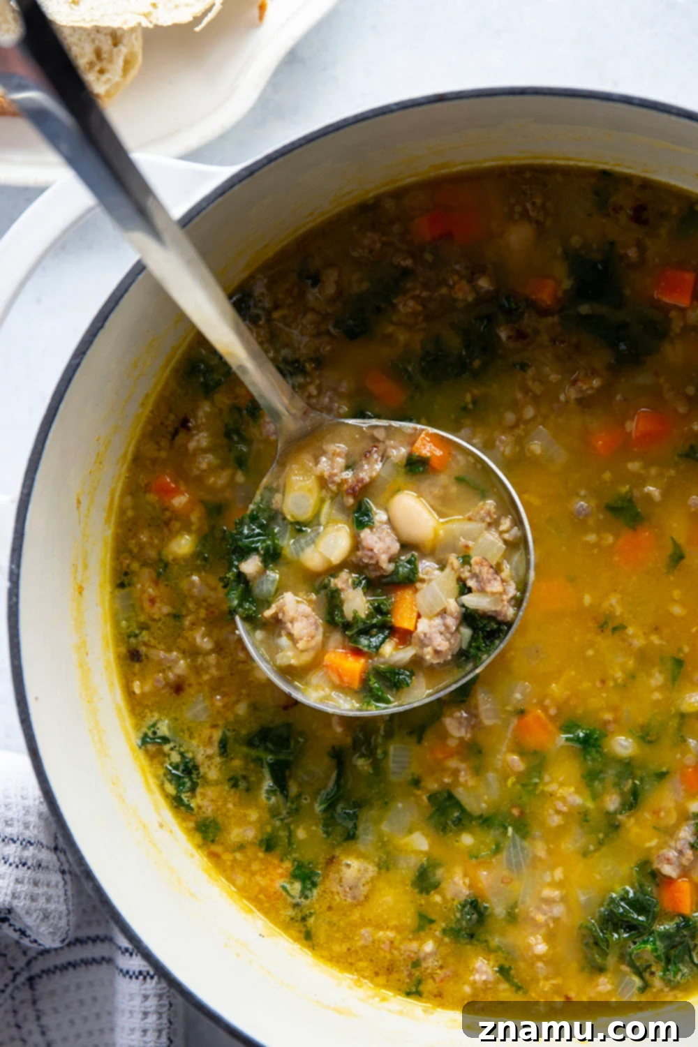 Hearty Miso White Bean And Sausage Kale Soup 6 Savory miso, tender white beans and browned sausage are incredible together in this hearty white bean kale sausage soup! Best paired with a thick wedge of bread for dipping.