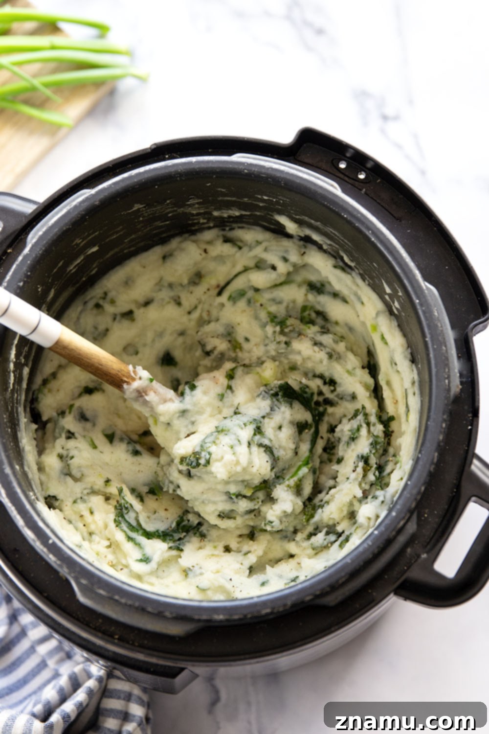 Quick Instant Pot Colcannon 2 This instant pot colcannon is made entirely in the instant pot in minutes and features perfectly fluffy mashed potatoes with buttery sauteed greens.