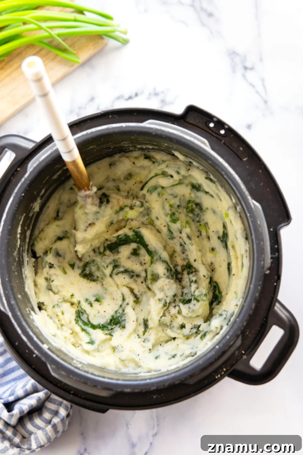 Quick Instant Pot Colcannon 5 This instant pot colcannon is made entirely in the instant pot in minutes and features perfectly fluffy mashed potatoes with buttery sauteed greens.