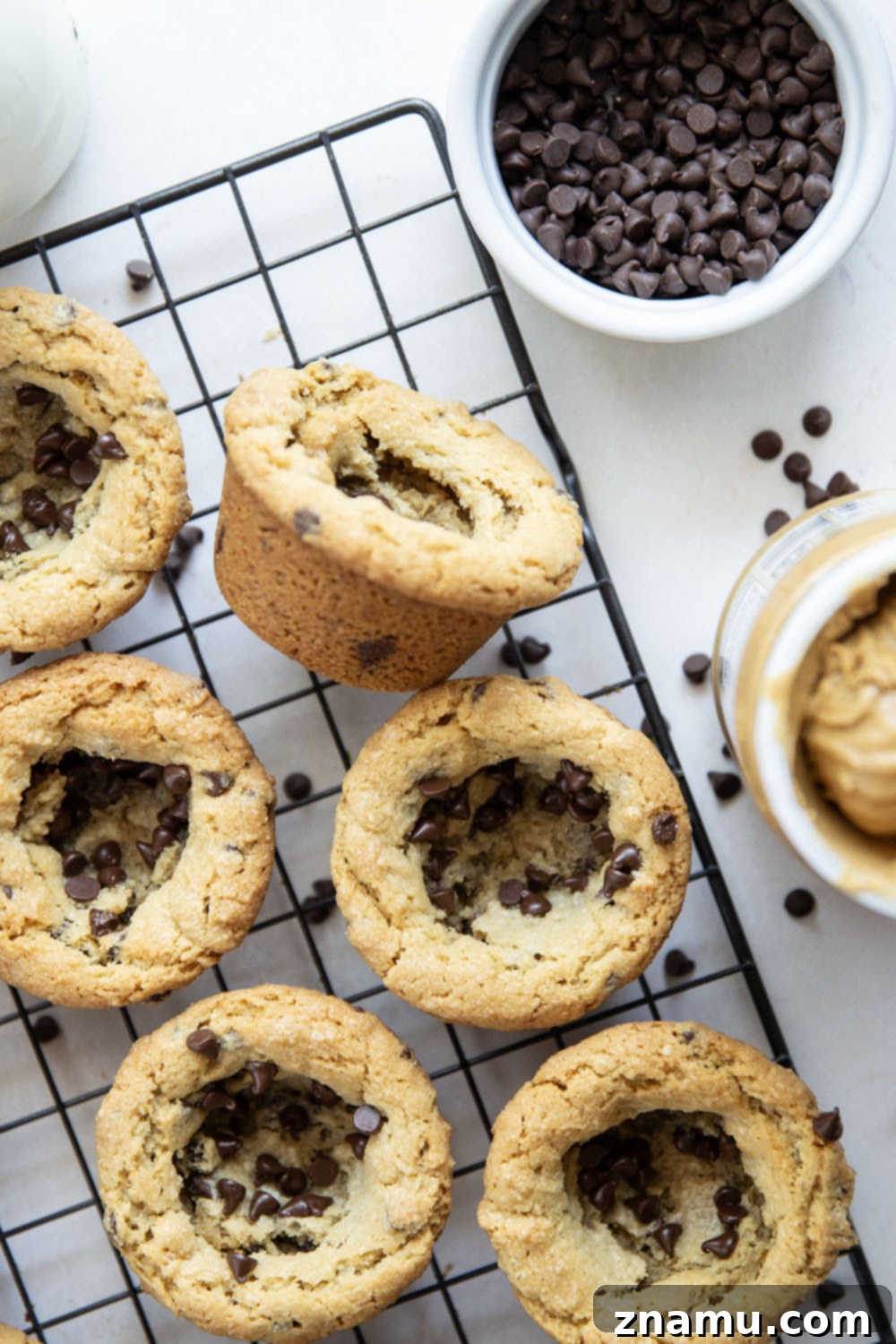 Ultimate Chocolate Chip Peanut Butter Cookie Cups 2 These soft and chewy peanut butter cookie cups are packed with plenty of creamy peanut butter and gooey chocolate chips. No-fuss, easy recipe that's ready in less than 30 minutes!