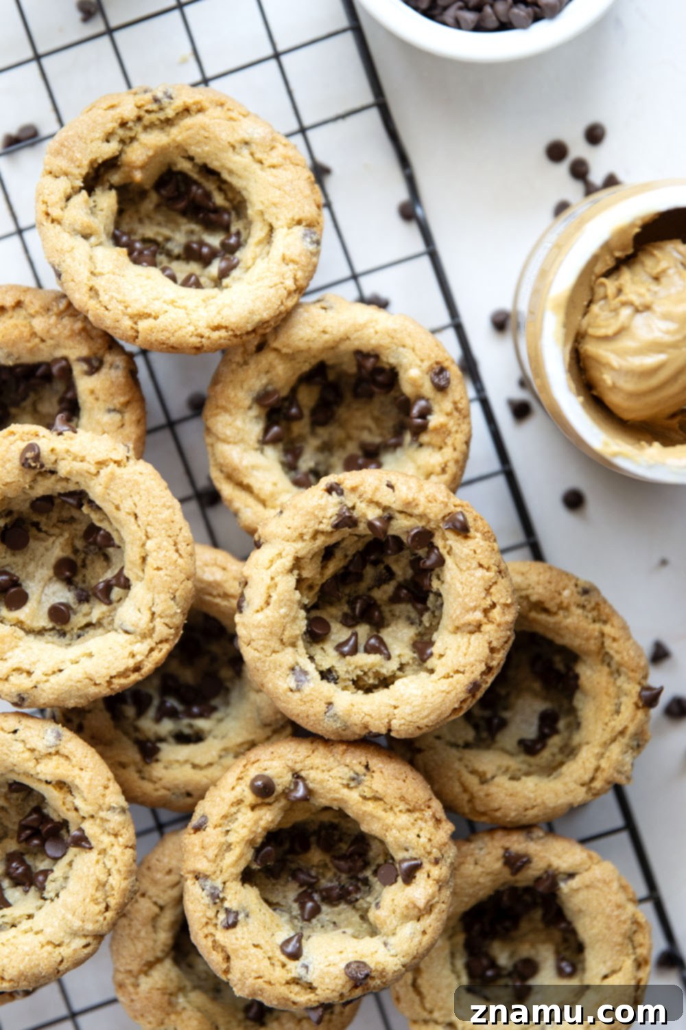 Ultimate Chocolate Chip Peanut Butter Cookie Cups 5 These soft and chewy peanut butter cookie cups are packed with plenty of creamy peanut butter and gooey chocolate chips. No-fuss, easy recipe that's ready in less than 30 minutes!