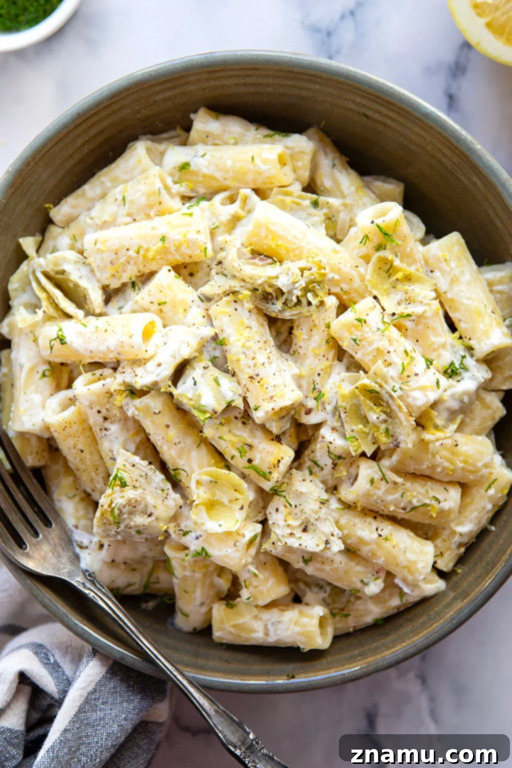 Zesty Lemon Artichoke Ricotta Pasta 5 Fresh lemon and tender artichoke hearts are the perfect pairing in this creamy lemon ricotta pasta! Ready in minutes with only a handful of ingredients.