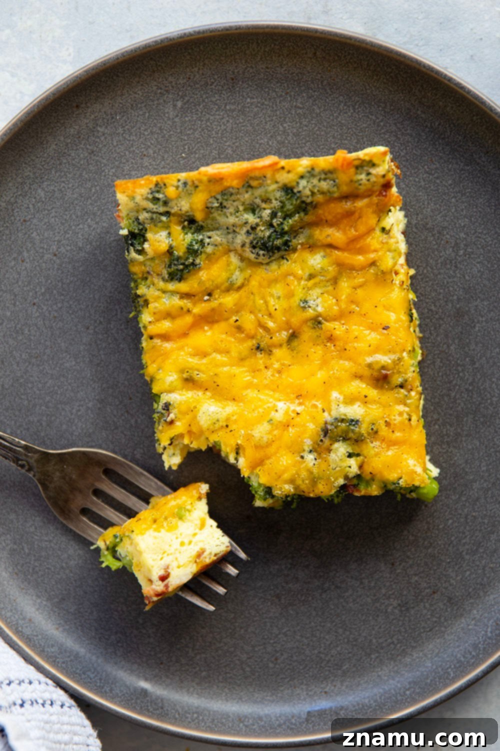 Golden Broccoli Cheddar Egg Bake 6 Tender broccoli and rich cheddar are a dream pairing in this easy cheddar broccoli egg bake that's perfect for serving brunch for a crowd!
