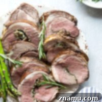 Stuffed with fresh rosemary and garlic, this perfectly roasted leg of lamb is an impressive and easy centerpiece for any occasion.