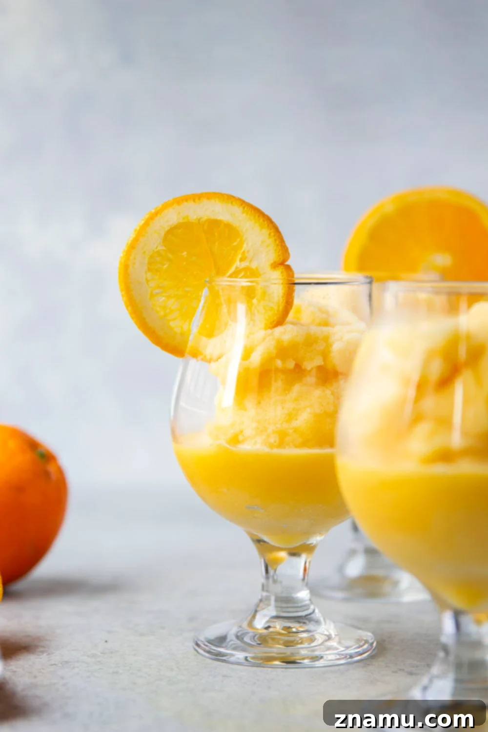 Orange Julius Frosted Delights 2 Refreshing homemade Orange Julius Slushies, easy 10-minute recipe with 5 ingredients.