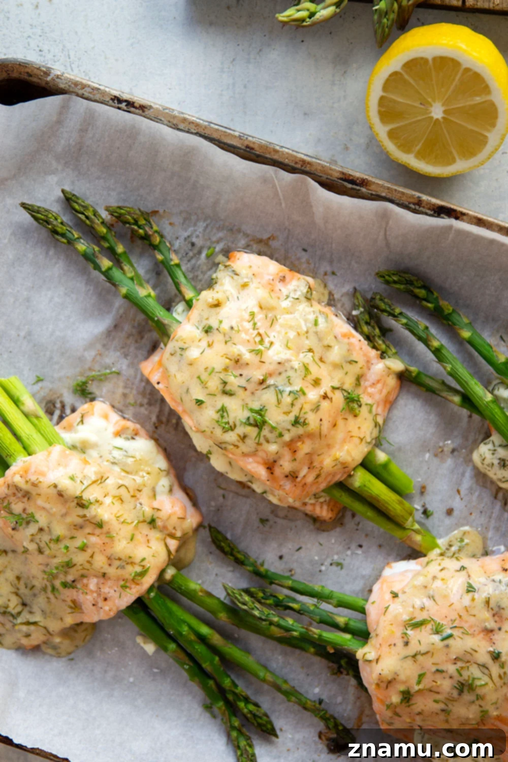Lemon Dill Salmon with Asparagus Stuffing 3 This asparagus stuffed salmon features tender salmon fillets stuffed with a mixture of herbed cream cheese and tender asparagus and then drizzled in a buttery lemon dill sauce.