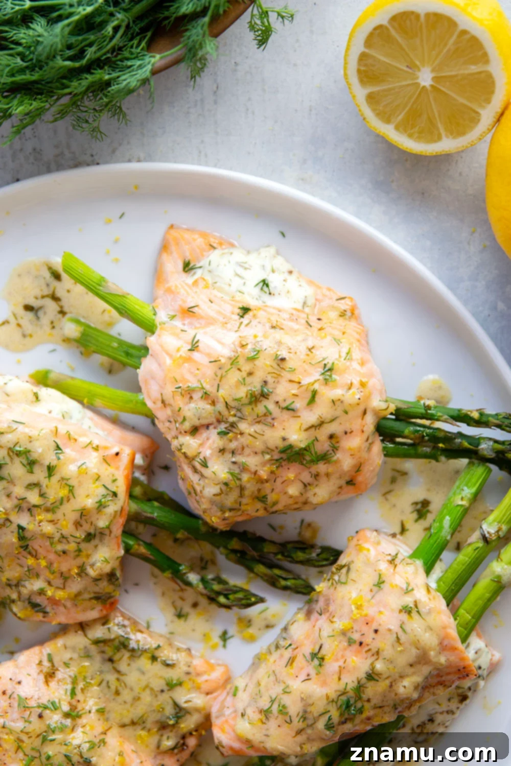 Lemon Dill Salmon with Asparagus Stuffing 6 This asparagus stuffed salmon features tender salmon fillets stuffed with a mixture of herbed cream cheese and tender asparagus and then drizzled in a buttery lemon dill sauce.