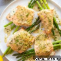 This asparagus stuffed salmon features tender salmon fillets stuffed with a mixture of herbed cream cheese and tender asparagus and then drizzled in a buttery lemon dill sauce.