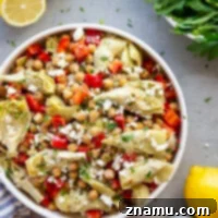 Zesty Artichoke and Crispy Chickpea Medley 8 Crispy Chickpea Artichoke Salad with Lemon Dressing, a hearty spring salad perfect for lunch or a side dish.