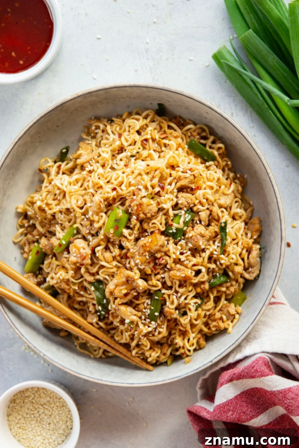 Sweet Chili Glazed Chicken Noodles 4 A close-up of the delicious Sweet Chili Noodles with ground chicken, highlighting the glossy sauce and perfectly cooked noodles, ready to be enjoyed.