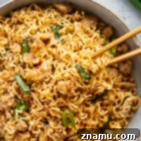 Sweet Chili Glazed Chicken Noodles 8 A delicious plate of Ground Chicken Sweet Chili Noodles, an easy and quick weeknight meal.
