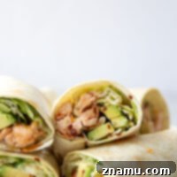 Sweet Heat Salmon Wrap 8 Hot honey glazed salmon, silky avocado, and a creamy scallion slaw are an incredible trio of flavors in this hot honey salmon wrap. An instant lunch level-up!