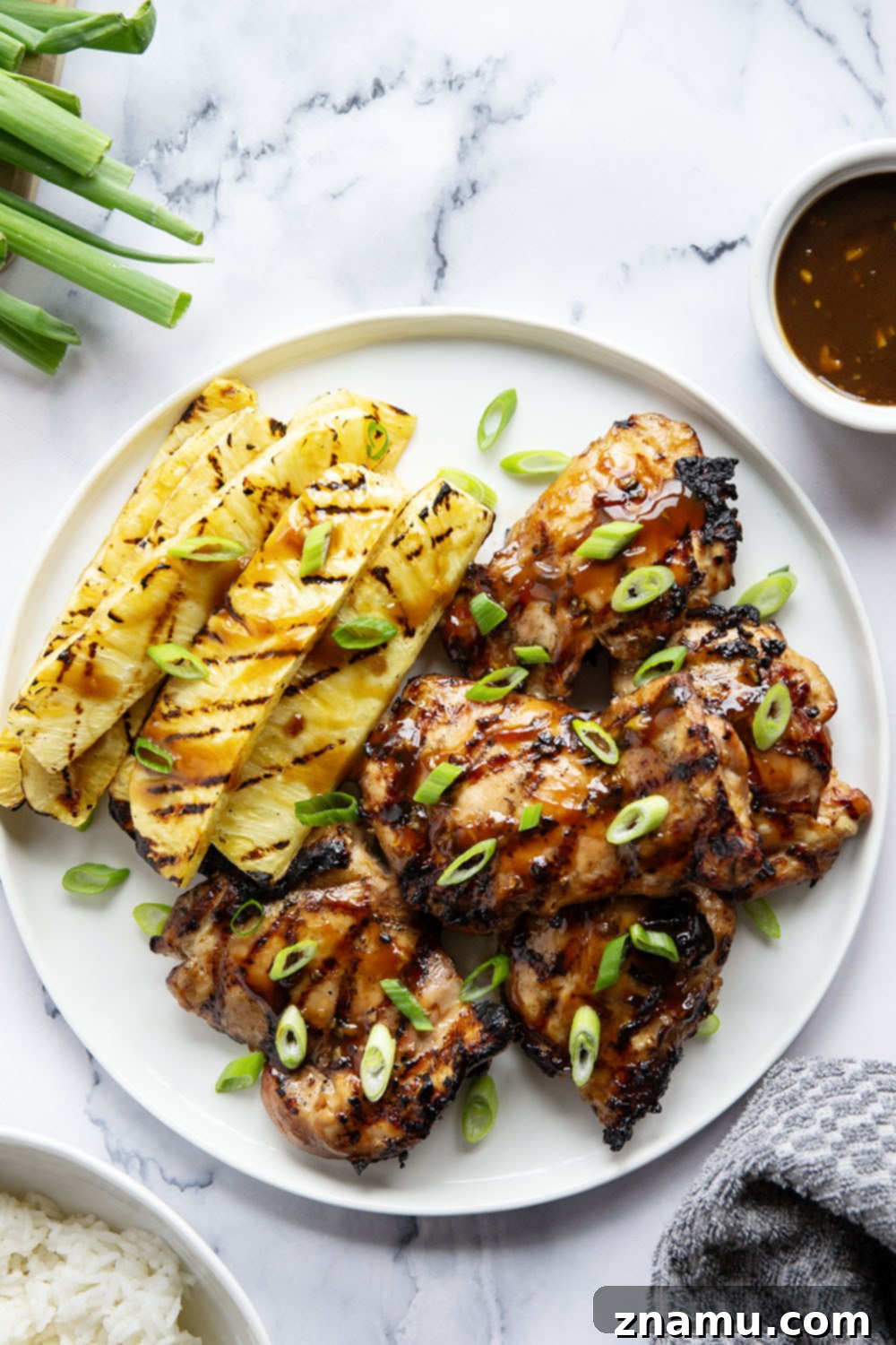 Grilled chicken and pineapple skewers with a brush of teriyaki glaze