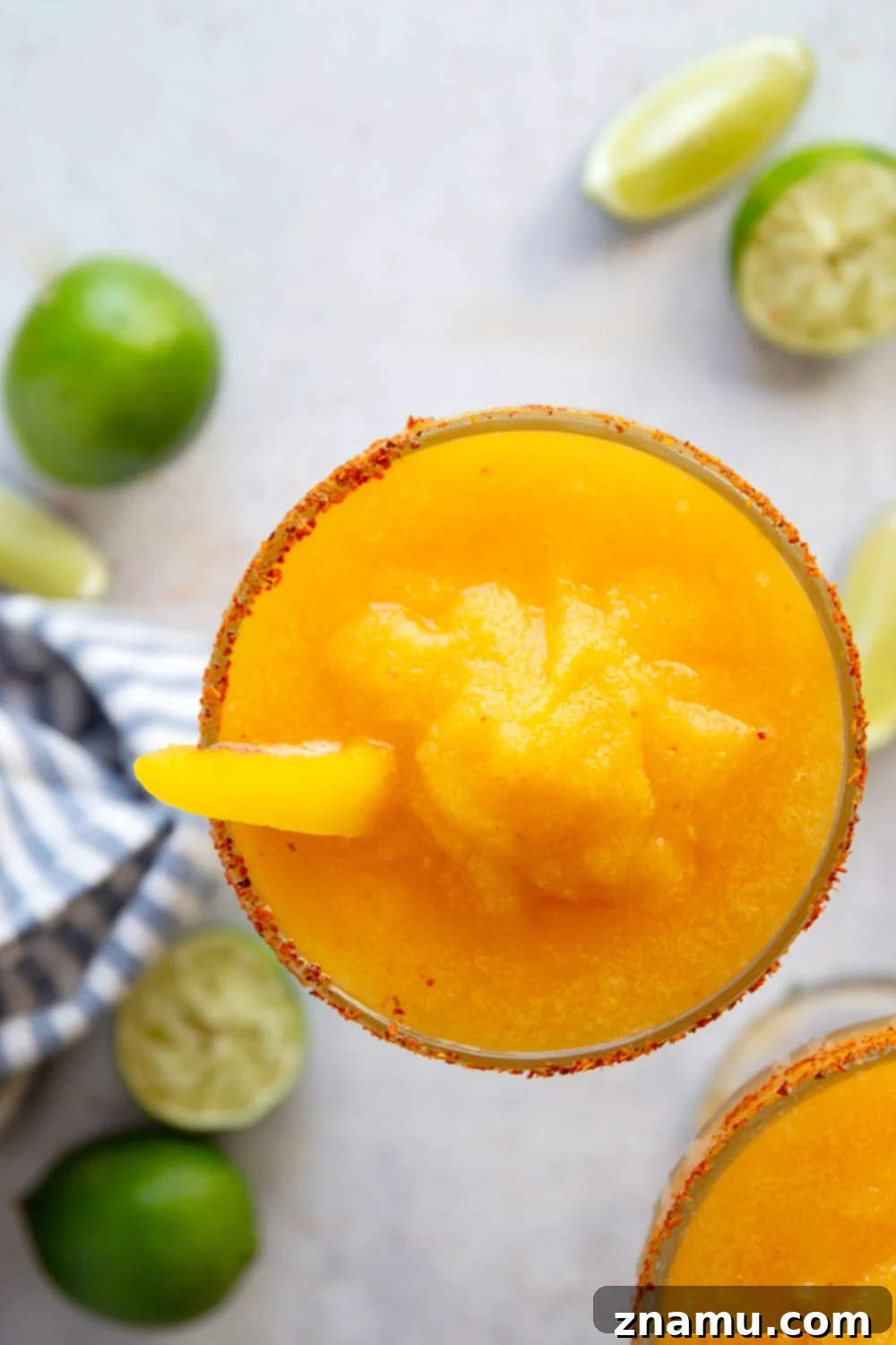 Frozen Peach Margarita 3 Blend up this frozen peach margarita in minutes with only a handful of ingredients! Serve them ice cold with a spicy tajin or salty rim.