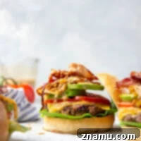A smaller image of the Loaded Cowboy Burger, ideal for a recipe card thumbnail, showing its rich and abundant toppings.